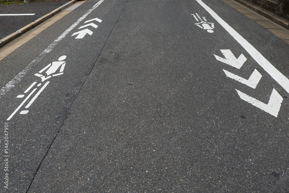 White bicycle navigation mark on the asphalt White bicycle navigation mark on the asphalt