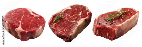 Fresh cuts of beef steak with marbling and herbs on a white background ready for cooking or grilling
