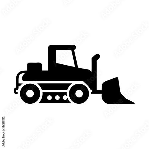 Heavy machinery working on construction site during daylight with clear sky and shadows cast from equipment