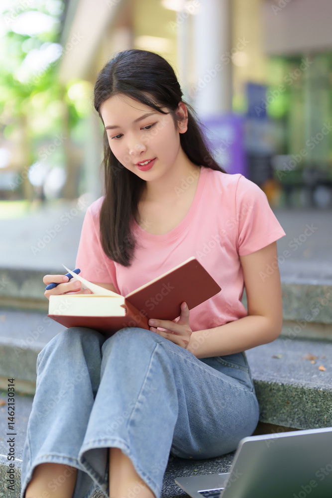 Obraz premium Asian Young Woman Study Notebook at Park Stairs University Education Learning Knowledge College Studying Hard Skill and Laptop for Online Course