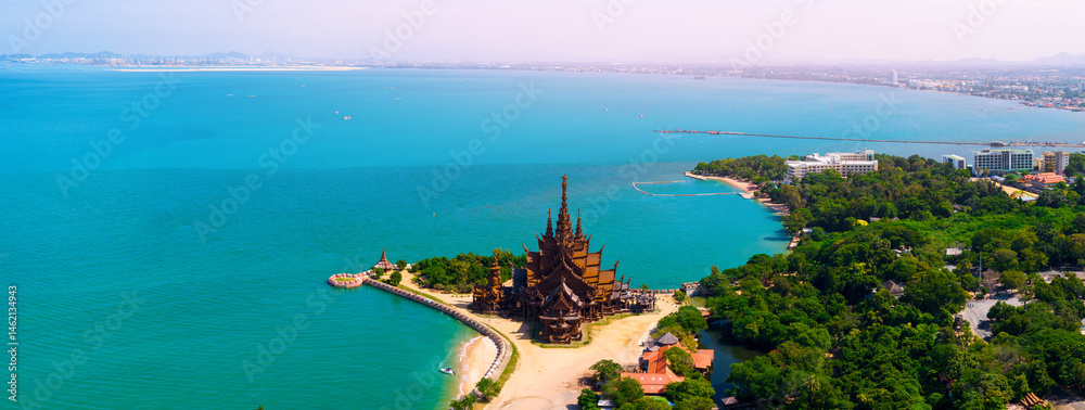 Naklejka premium Aerial view panorama Pattaya with Sanctuary of Truth wooden temple Thailand.