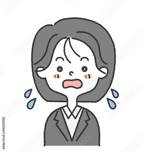 スーツを着た女性社員が焦っている顔