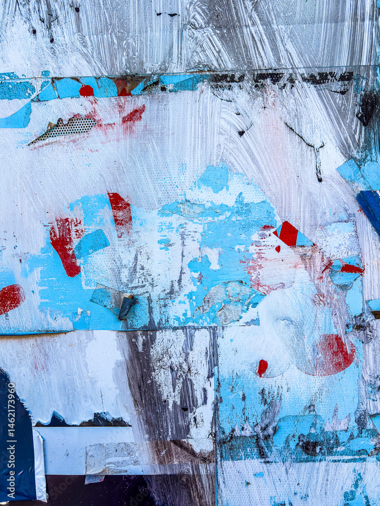 Layers of old colorful posters on wall damaged by time for your grunge style design