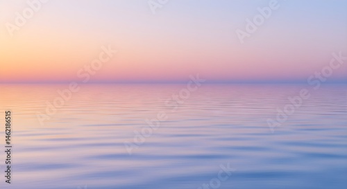 Obraz na płótnie Serene sunset over calm water. Peaceful pastel colors. w salonie