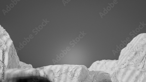 Bottle of perfume is shown on a rocky surface. The bottle is black and has a black cap. The bottle is placed on a rock, and the rock is surrounded by other mossy rocks. Premium photo 3d render.