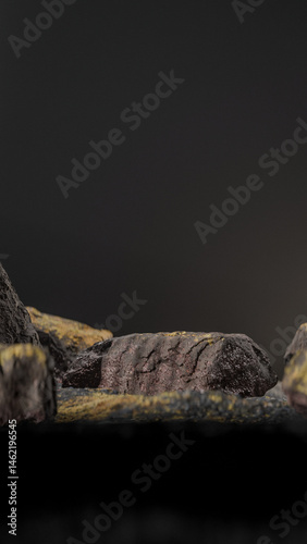 Bottle of perfume is shown on a rocky surface. The bottle is black and has a black cap. The bottle is placed on a rock, and the rock is surrounded by other mossy rocks. Premium photo 3d render.