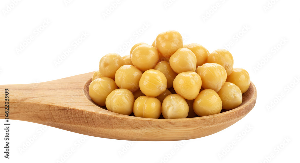 A wooden spoon filled with yellow chickpeas.