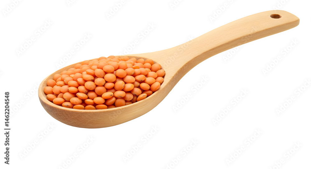Red lentils in a wooden spoon. Healthy food.