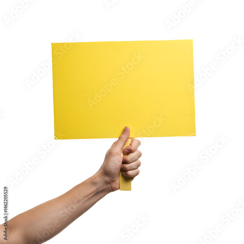 Obraz na płótnie A person holds a bright yellow sign, ready for your message. w salonie