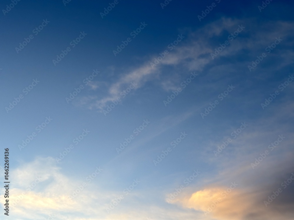 Fototapeta premium beautiful evening sky, natural blue orange gradient background, light to dark transition atmosphere