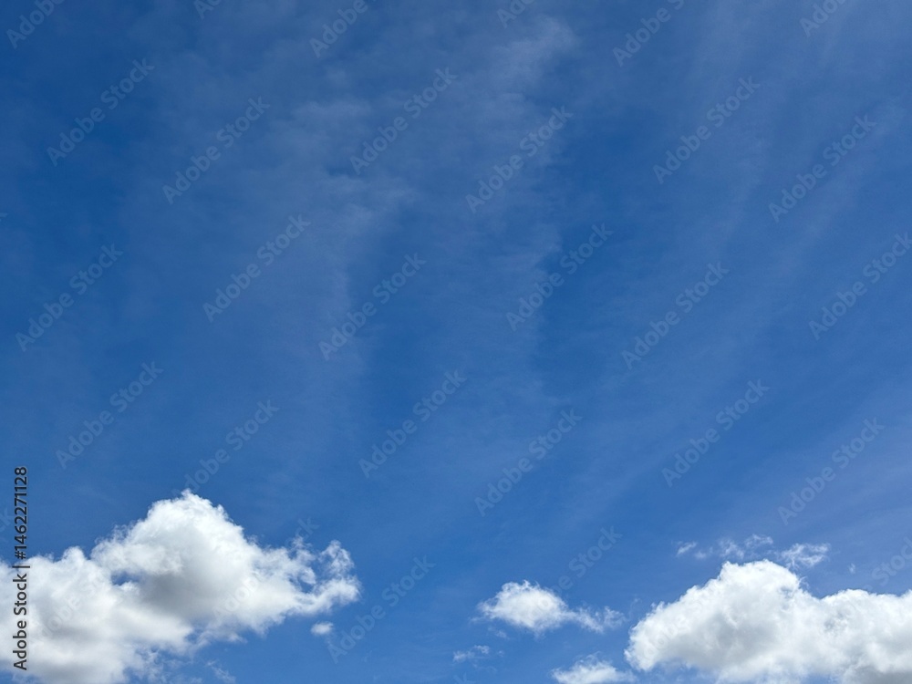 Fototapeta premium bright blue sky beautiful white clouds, creative natural background