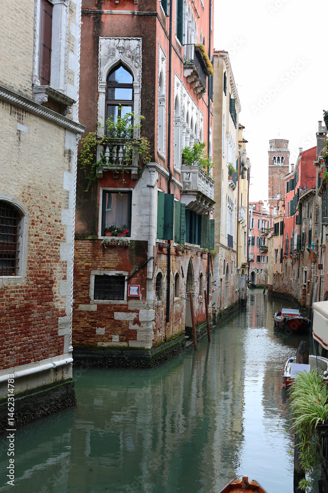 foreshortening of Venice Island in Italy and the water of navigable canal