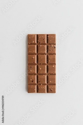 Close-Up of Broken Milk Chocolate Bar Pieces with Smooth Texture and Rich Brown Color, Isolated on Clean White Background, High-Resolution Food Photography for Sweet Dessert and Candy Concepts