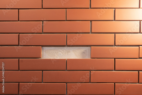 Old Red Brick Wall Background with Textured Surface and Brick Pattern