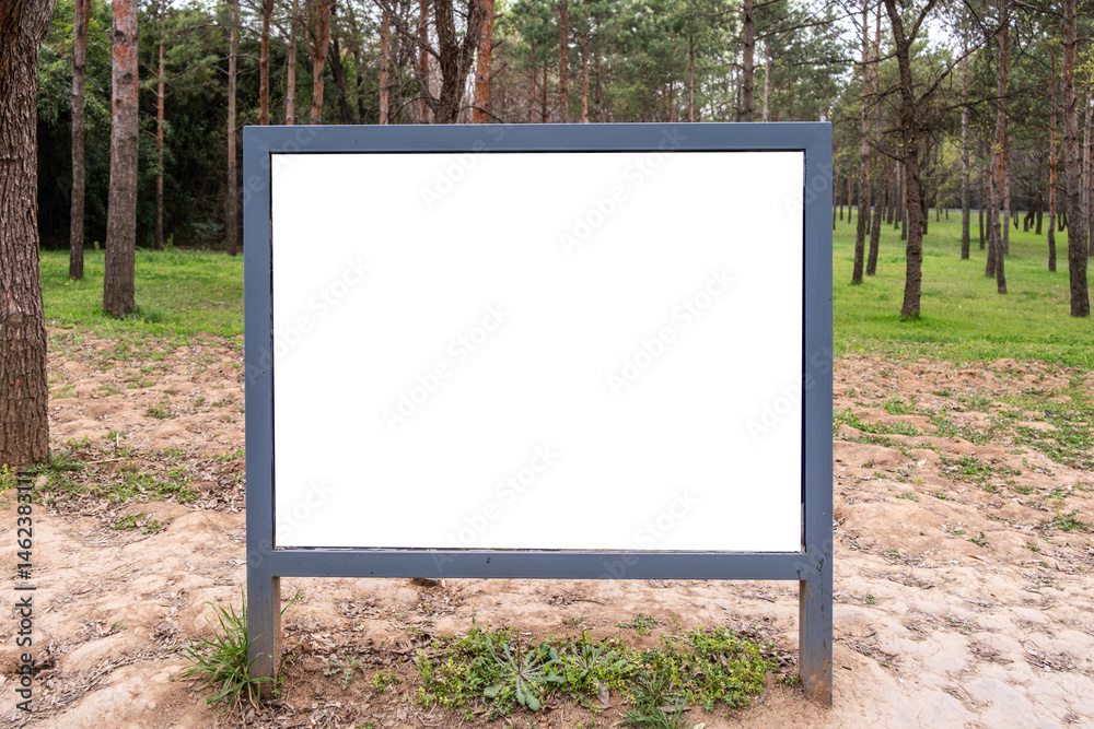 Signboard white blank in a park, empty sign board template for information and advertise