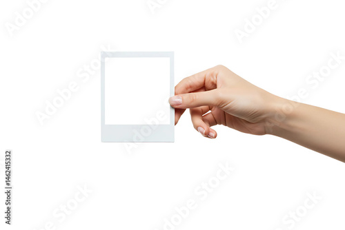 A hand holds a polaroid blank picture isolated on transparent background 