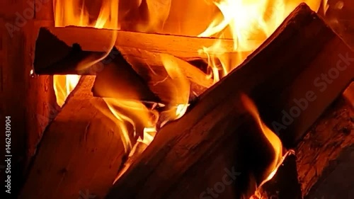 A burning fireplace in the house in autumn for background