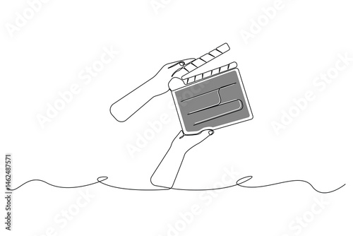 Hands holding a clapper board line art drawing. Holding a clapper board linear icon vector.