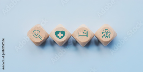 Health insurance concept. Health care checkup and healthy trends. Access to welfare health. Wellness and medical. Wood cube and healthcare insurance icon on pastel blue background. World health day