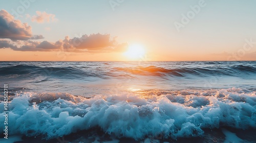 Vibrant sunset over ocean waves