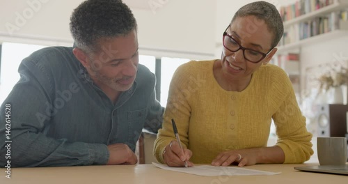 Wallpaper Mural Couple working together on a financial document Torontodigital.ca