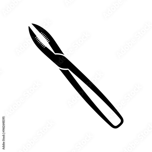 Precision in Silhouette: A stark, high-contrast silhouette captures the essence of surgical tool