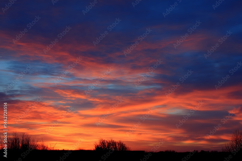 Fototapeta premium Colorful orange blue sunset sky gradient view
