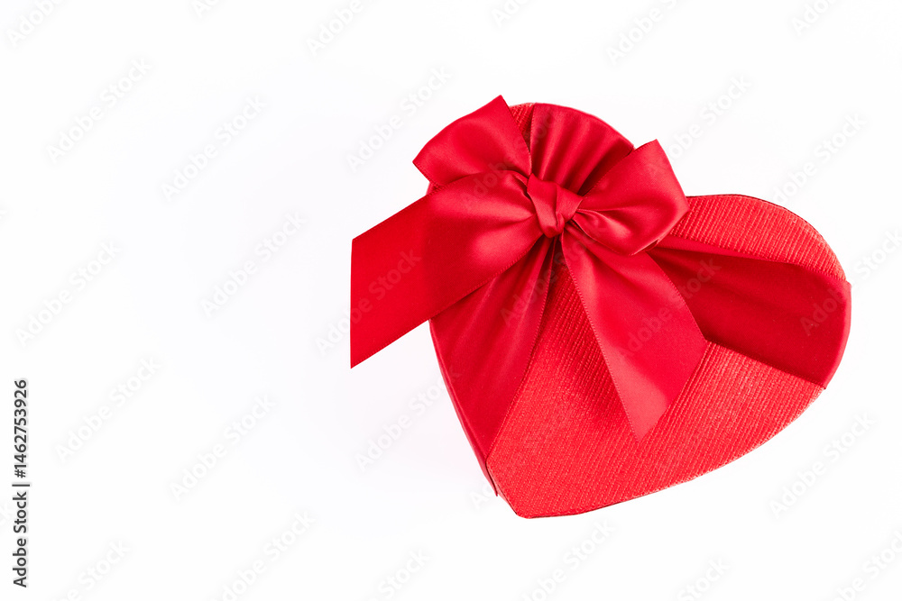 Red and heart shaped chocolate or candy box on white background