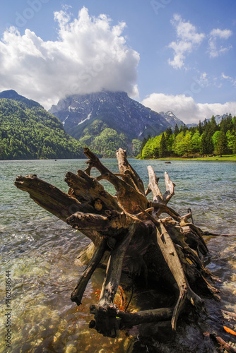Predil Lake in the Julian Alps, Tarvisio with mountains in background, Italy, Europe
