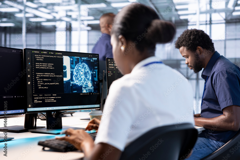 Server farm IT specialist doing AI research next to coworker, implementing algorithms using neural networks. Software developer in data center using artificial intelligence computational models