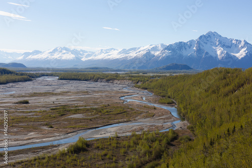 Rivers run off into a basin surrounded by mountains in Alaska.
