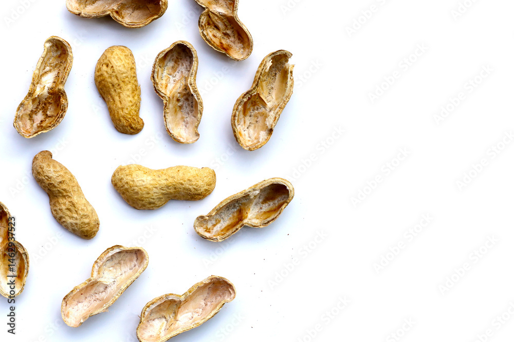 Obraz premium Peanut shells on white background.