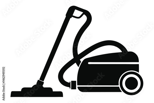 Black and white vacuum cleaner showcases domestic equipment ready for household cleanup work