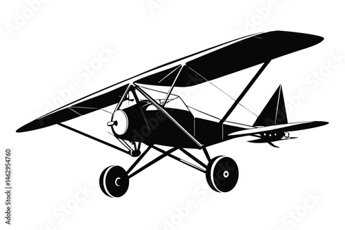 A vintage biplane soars in silhouette, an iconic of early aviation history