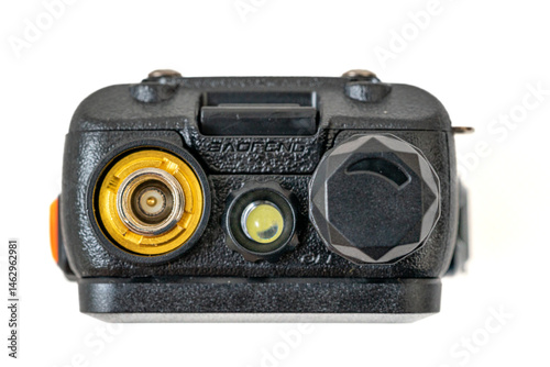 SMA link for antenna and volume knob of Baofeng UV-5RX triband walkie talkie radio,white background. photo