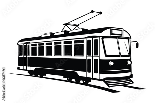The black and white vintage tram glides smoothly along its tracks in the city