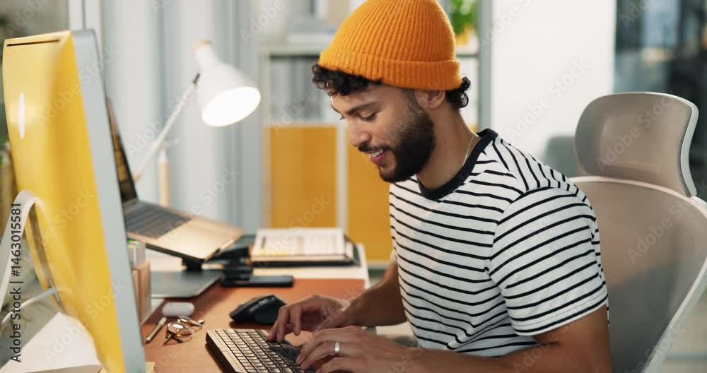 Man, creative and typing at computer with smile, digital animator and software for design at desk. Productivity, happiness and keyboard with visual effects or animation process at startup workplace