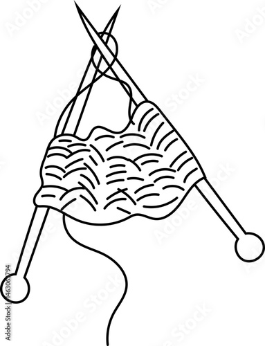 Knitting needles crossed with yarn for handmade crafts