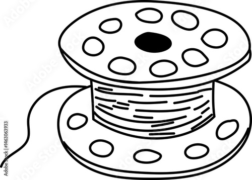 Bobbin with thread used in sewing machine setup
