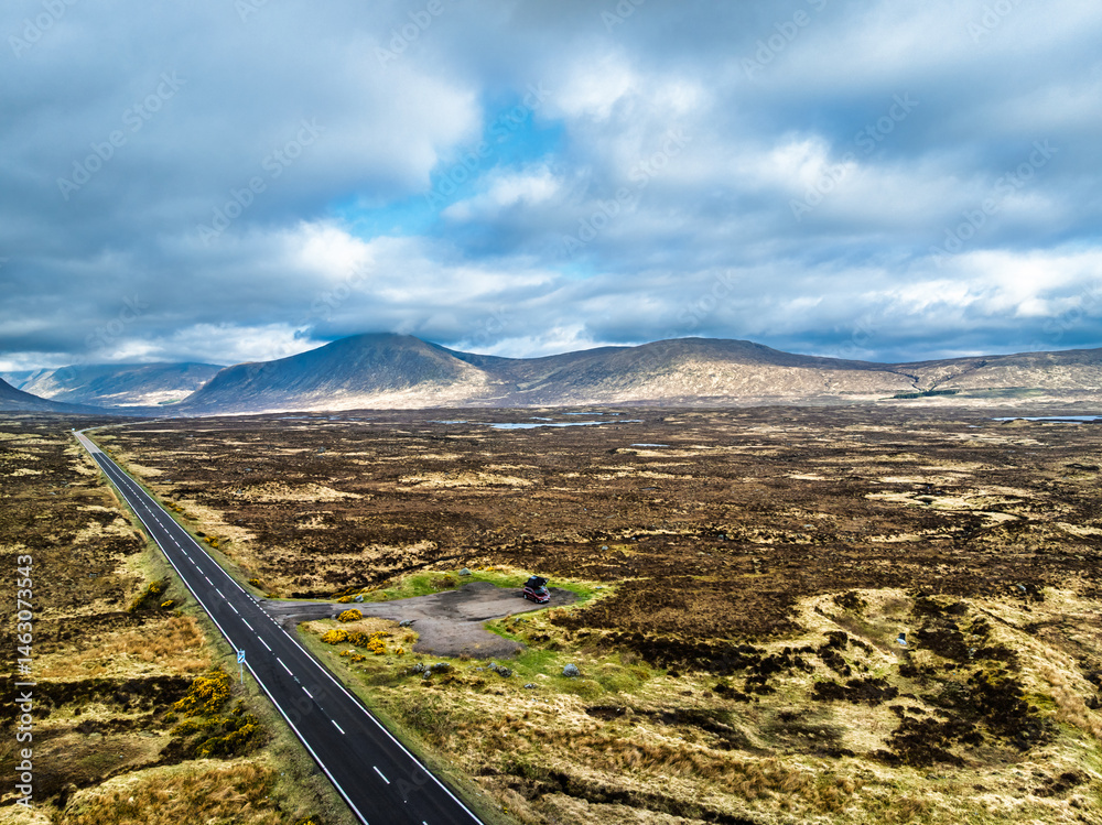Moors and Road A82 over Glencoe Valley from a drone, Highland, Scotland