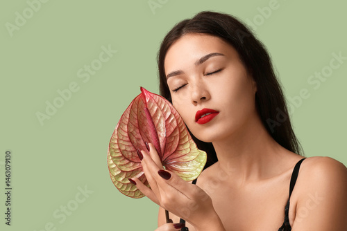 Beautiful young woman with ...