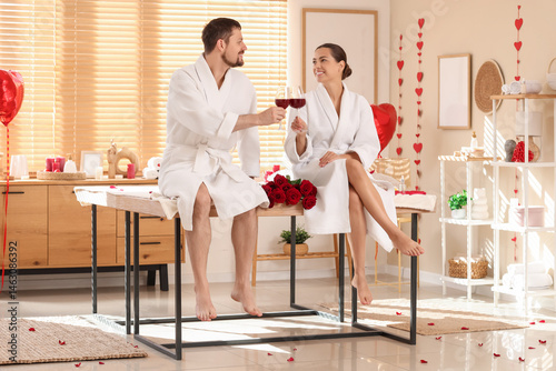 Young couple with wine in s...