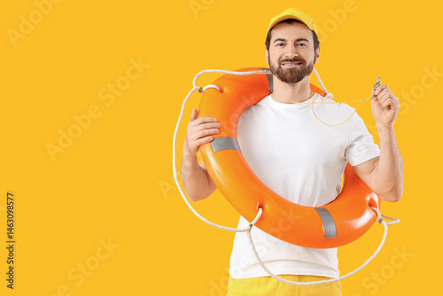 Beach rescuer with lifebuoy...