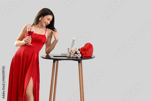 Happy young woman video cha...