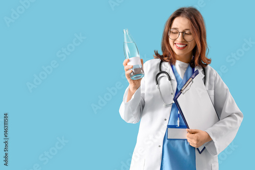 Female doctor with bottle o...