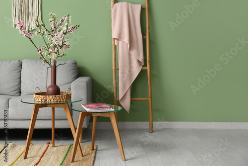 Sofa with ladder, coffee ta...