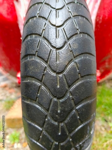 Close-up of Black Tire Tread Pattern for Traction and Safety