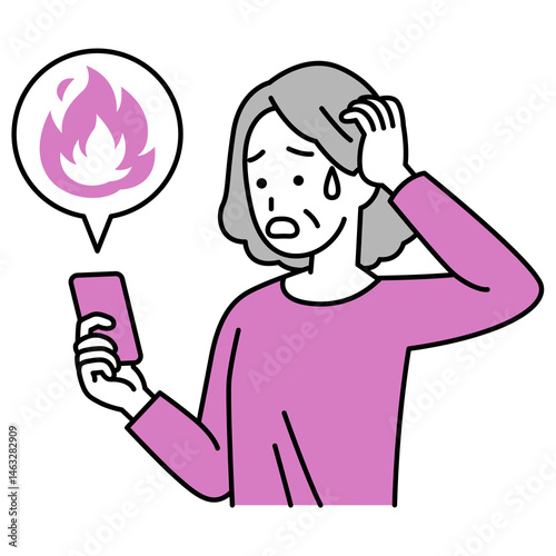 SNSが炎上して困惑している年配の女性（スマートフォン）