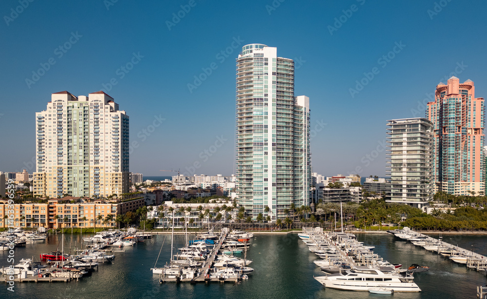 Obraz premium Aerial view of Miami skyline banner. Drone shot of Miami cityscape. Top view of South Miami and the ocean.