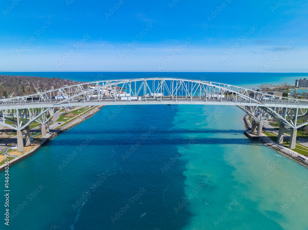 Blue Water Bridge is an international bridge across the St. Clair River links Port Huron, Michigan, USA (left) and Point Edward, Ontario, Canada (right).